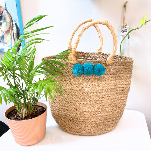 Natural Jute Tote Bag with Blue Pom Accents – 13" H x 16" W