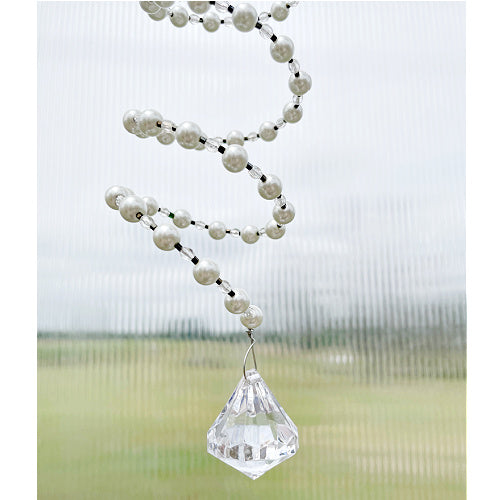 Pearlescent Radiance: Pearl and Crystal Slinky Window Hanging