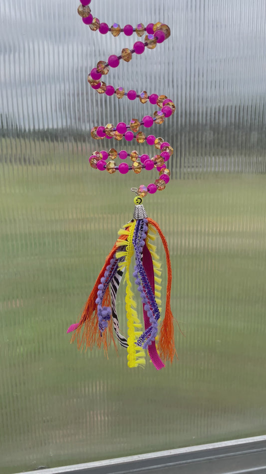 Summer Flair: Pink and Yellow Beaded Slinky with Tassel