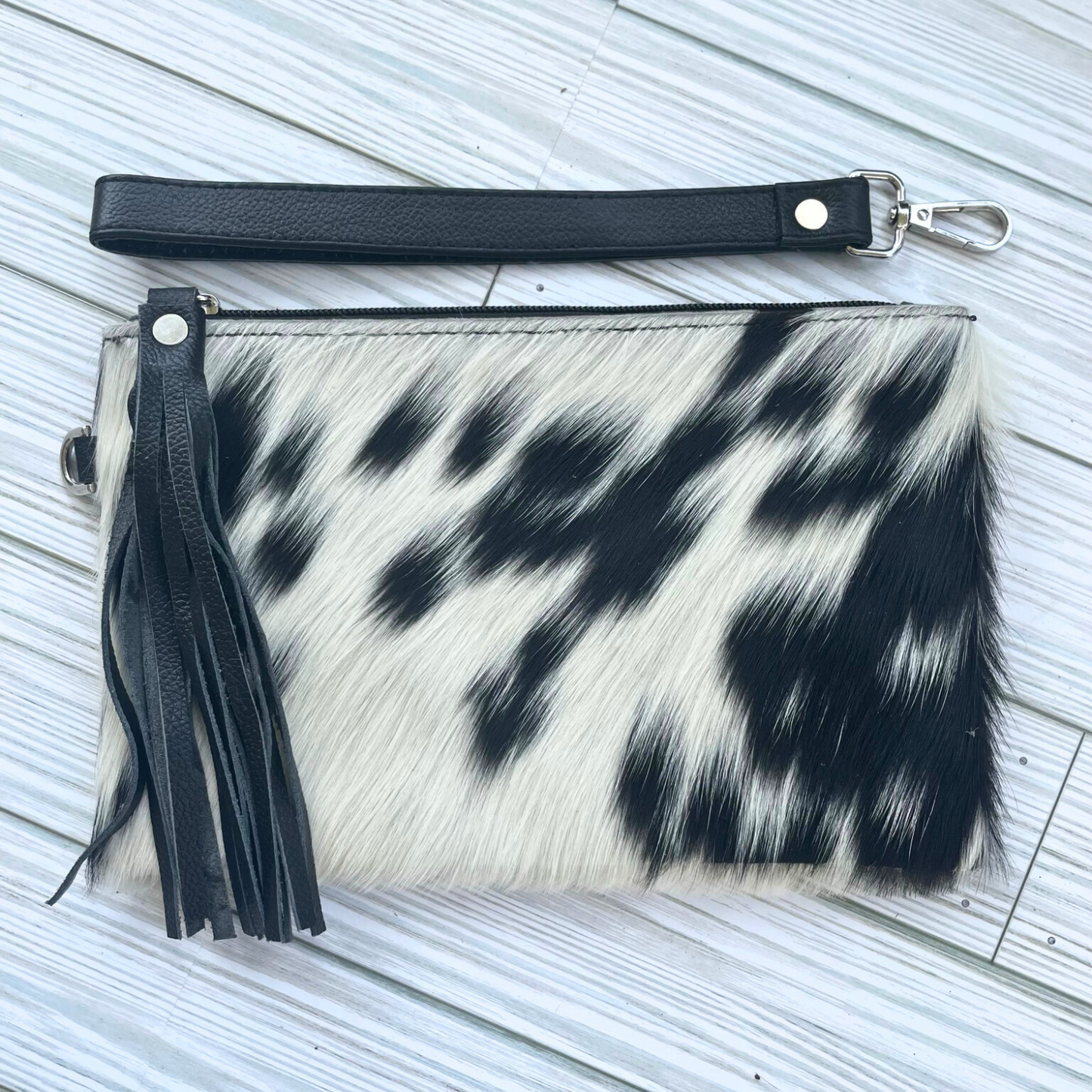 Black and White Cowhide Wristlet Clutch with Leather Tassle