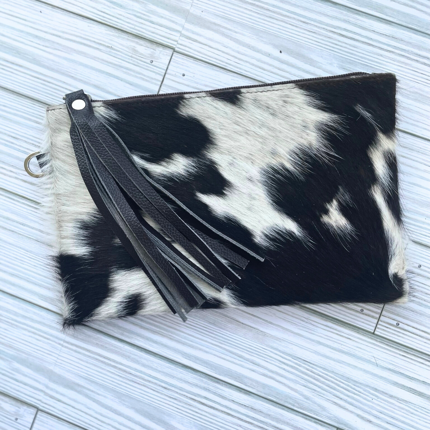 Black and White Cowhide Wristlet Clutch with Leather Tassle