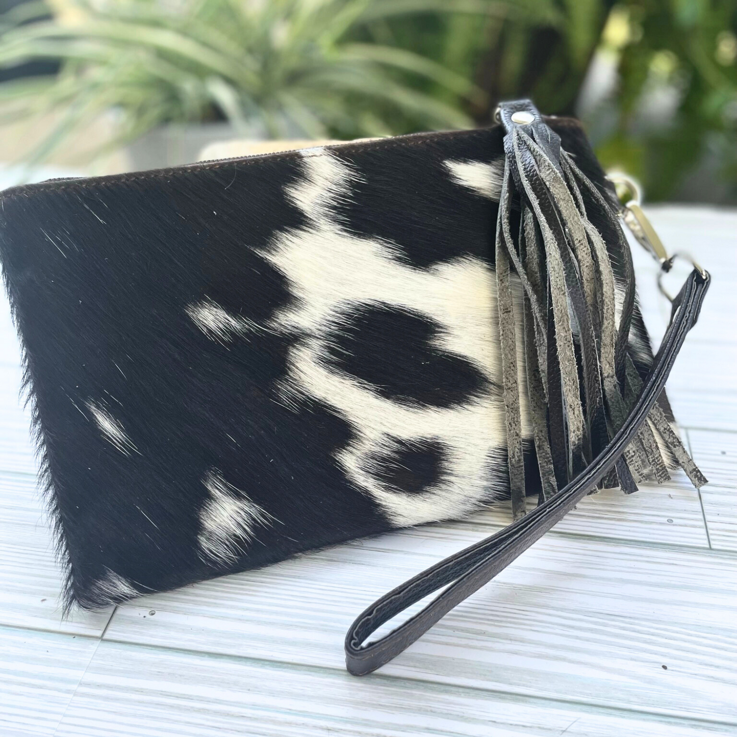 Black and White Cowhide Wristlet Clutch with Leather Tassle