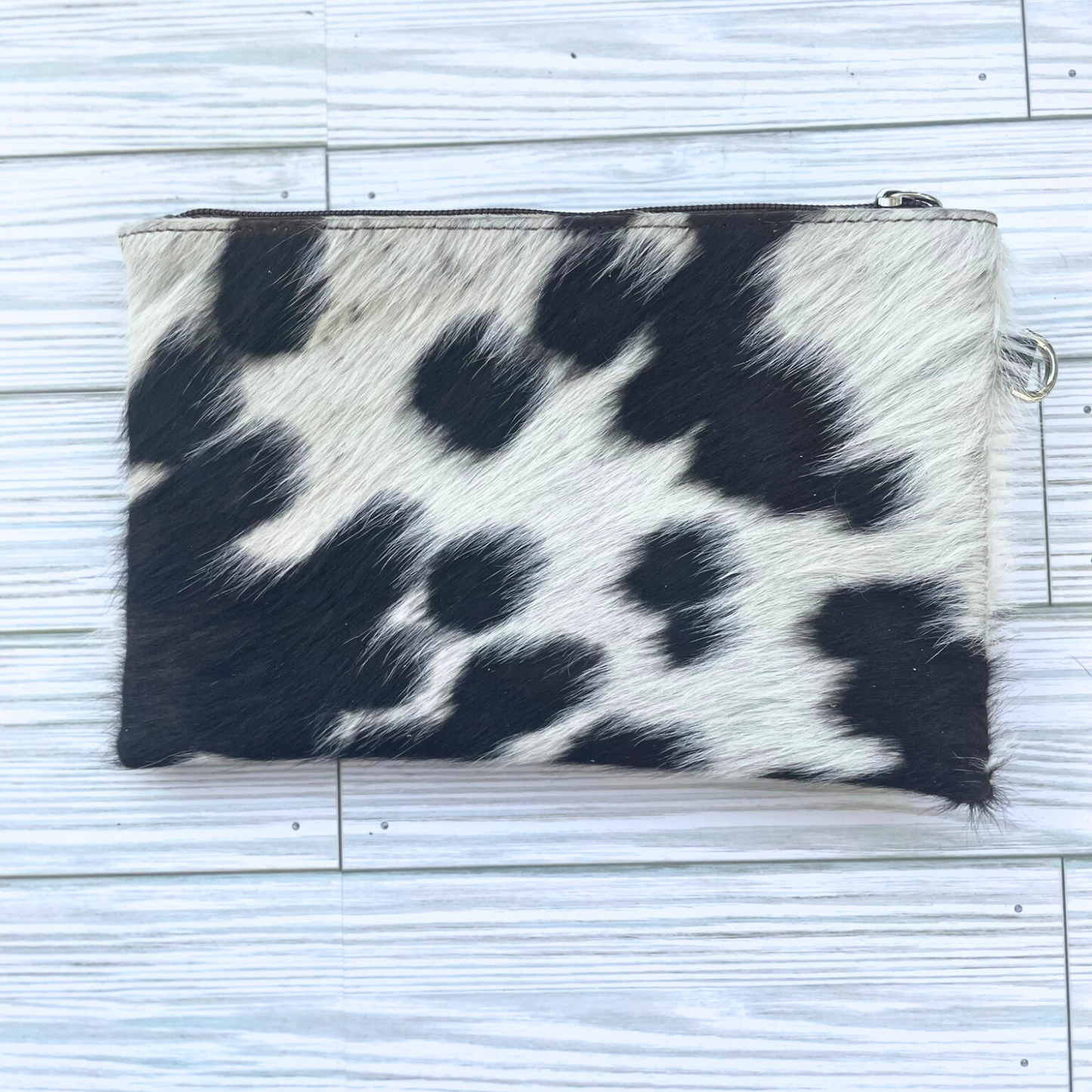 Black and White Cowhide Wristlet Clutch with Leather Tassle