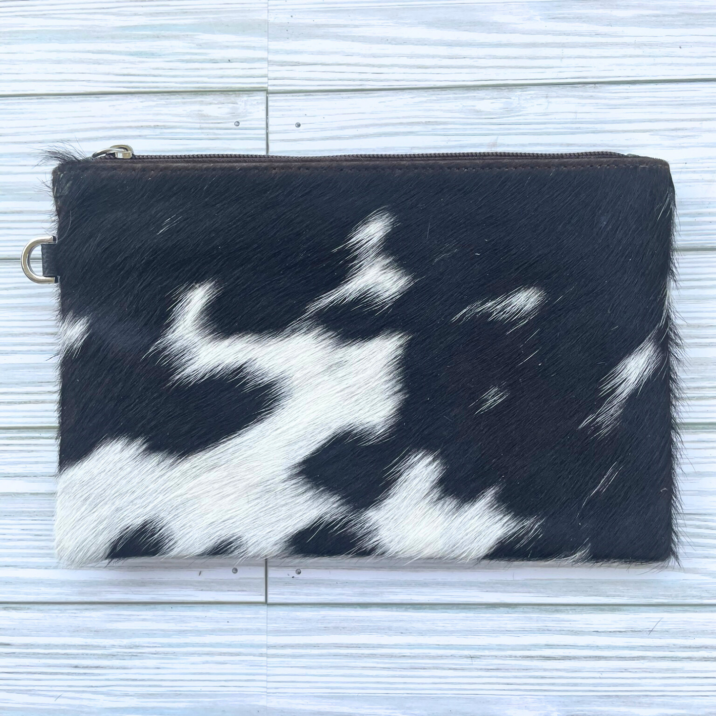 Black and White Cowhide Wristlet Clutch with Leather Tassle